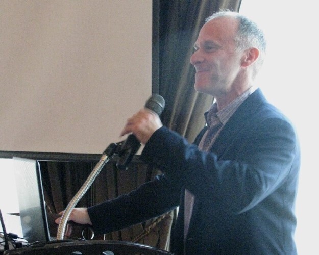 Gordon Gibbons speaking at the retirement of David Ayriss